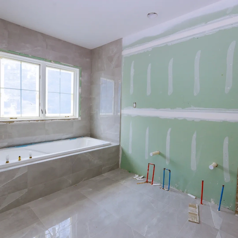 Ogden Utah plumber installing new construction plumbing